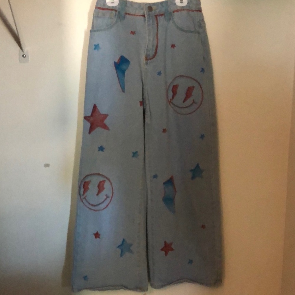 Size 2 woman’s boyfriend jeans w/ customized drawings